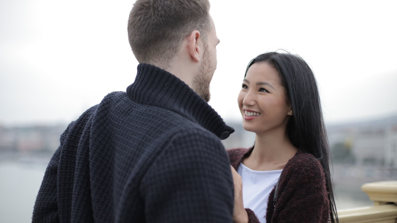 happy-couple-standing-on-the-bridge-3973201 (1).jpg