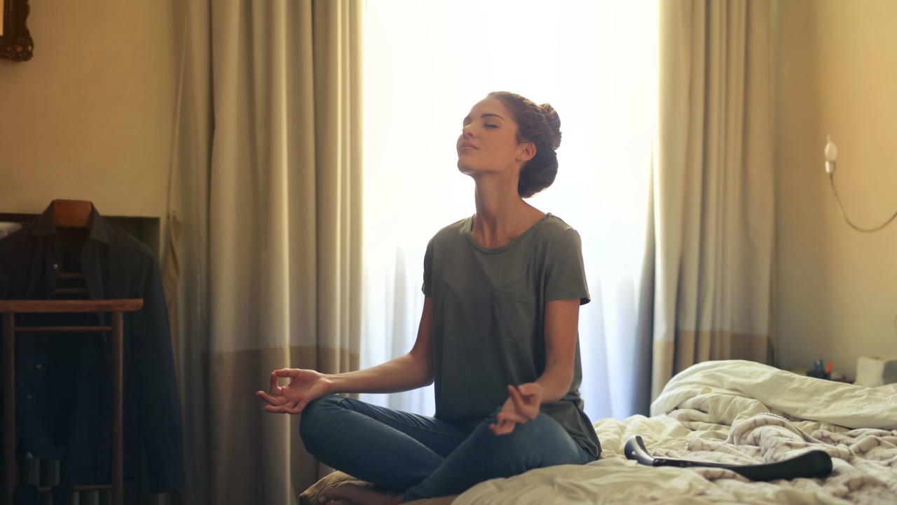 woman-meditating-in-bedroom-3772612 (1).jpg