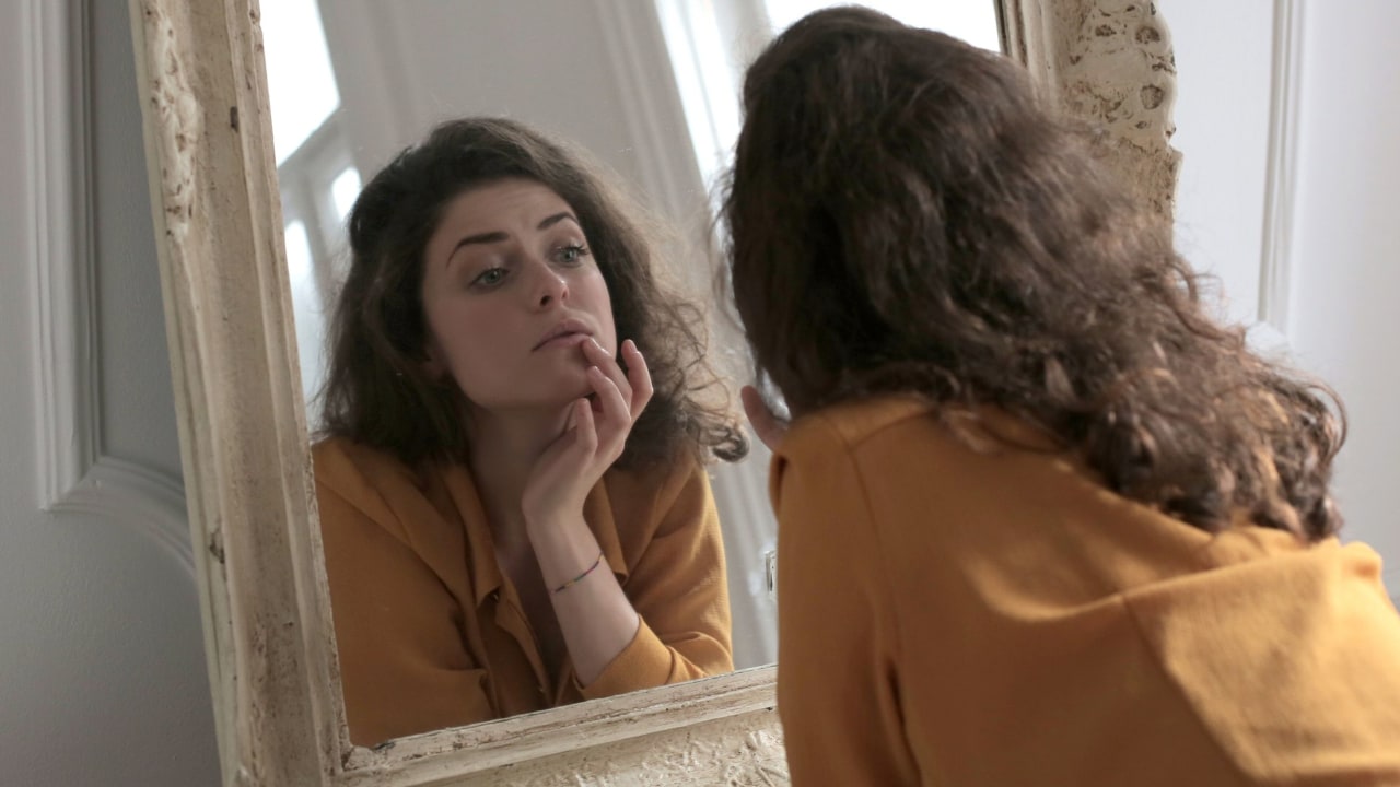 woman-in-yellow-long-sleeve-shirt-in-front-of-a-mirror-3979175 (1).jpg