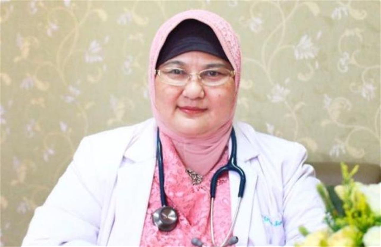 dr Erlina Burhan