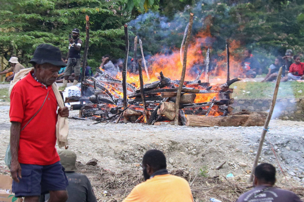 kumplus- Opini Iqbal Aji Daryono- MUtilasi di Papua