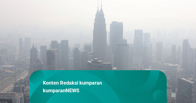 Foto: Langit Kuala Lumpur Muram Diselimuti Kabut Asap