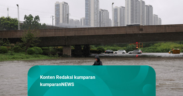Foto: Topan Dolphin Bikin Kota Luohe dan Zhengzhou di China Kebanjiran