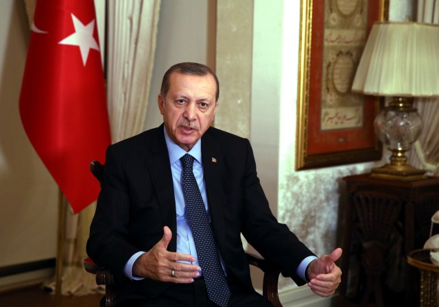 Presiden Turki Recep Tayyip Erdogan memberikan keterangan terkait insiden penembakan terhadap Dubes Rusia Andrei Karlov (Foto: Press Presidency Press Service/AP)