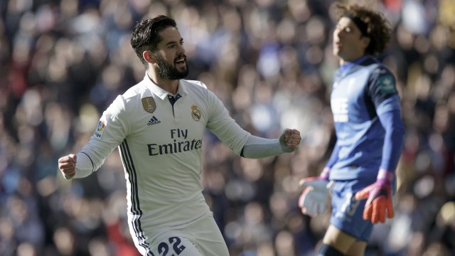 Isco merayakan gol ke gawang Granada (Foto: Gonzalo Arroyo Moreno/Stringer)