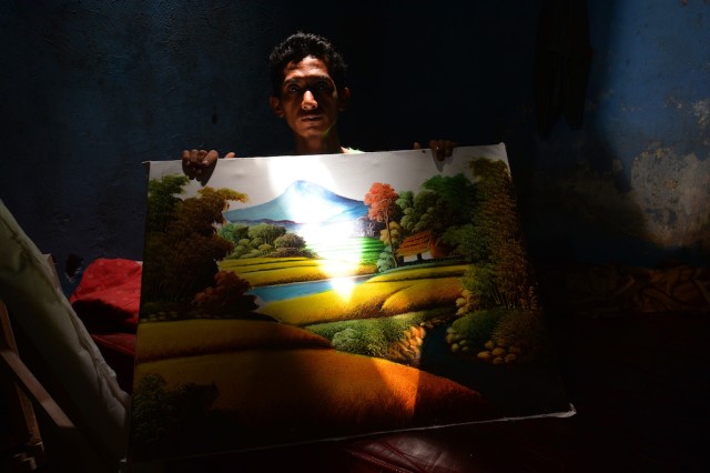 Pelukis Jelekong dari Bandung (Foto: Andika Wahyu/Antara)