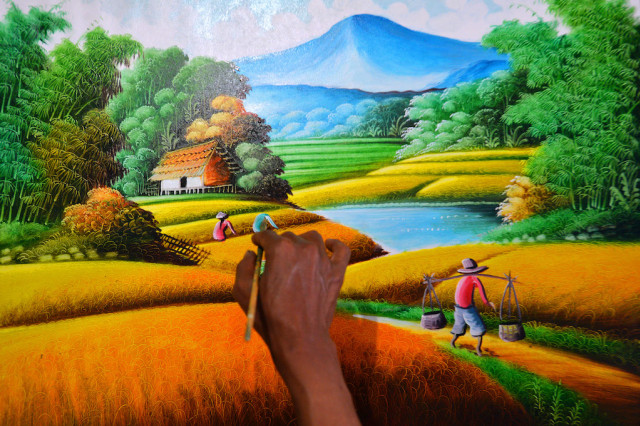 Warna begitu mencolok di lukisan Jelekong (Foto: Andika Wahyu/Antara Foto)