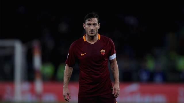 Totti tatap garis akhir. (Foto: Paolo Bruno/Stringer)