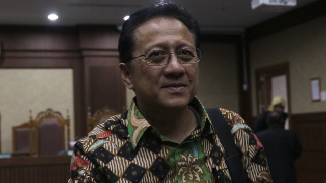 Irman Gusman meninggalkan ruang sidang. (Foto: Fanny Kusumawardhani/kumparan)