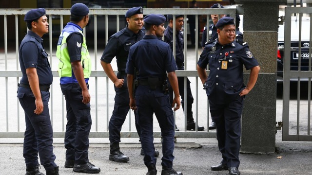 Polisi Malaysia  Foto: Athit Perawongmetha/Reuters