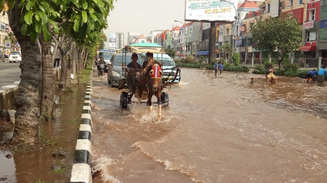 ilustrasi banjir di Kelapa Gading  Foto: Aria Pradana/kumparan 