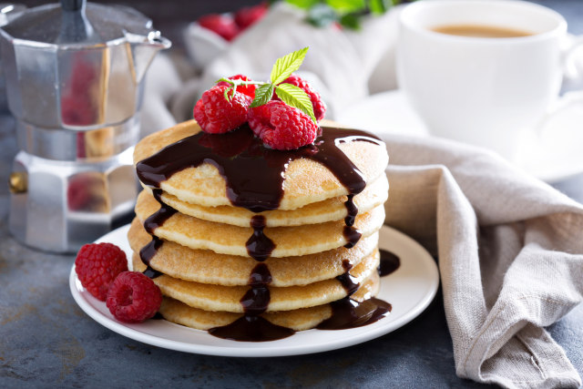 Perpaduan selai coklat dan raspberry pada pancake. (Foto: Thinkstockphotos)