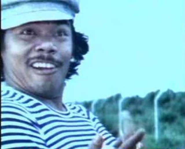 Benyamin S di salah satu adegan film (Foto: arsip perpusnas.go.id)