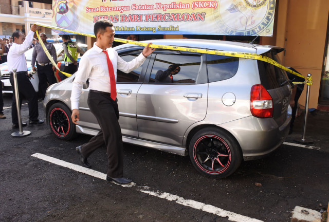 Mobil tersangka penembakan (Foto: Seno/Antara)