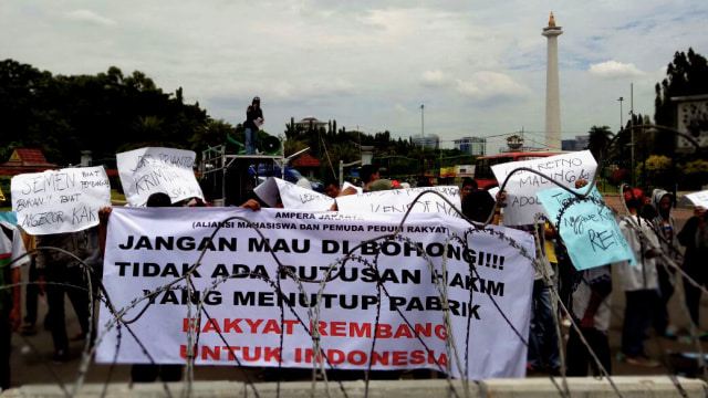 Aksi damai mendukung pabrik semen di Rembang (Foto: David Pratama/kumparan)
