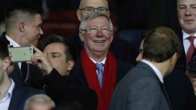 Sir Alex Ferguson pada laga Man Utd vs Rostov. (Foto: Andrew Yates/Reuters)