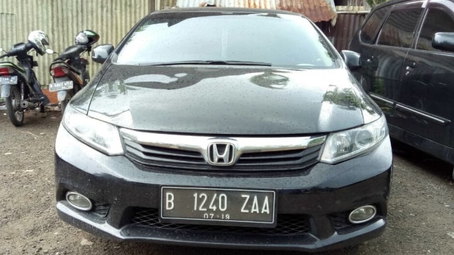 Mobil Ridho Rhoma di Polres Metro Jakarta Barat. (Foto: David Pratama/kumparan)