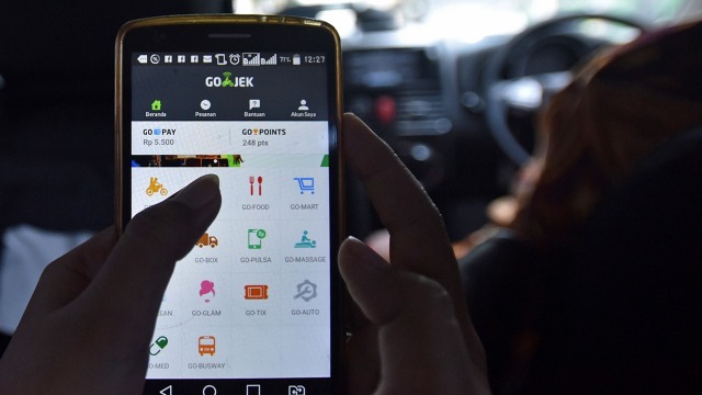 Aplikasi transportasi online. (Foto: Antara/Wahyu Putro A.)