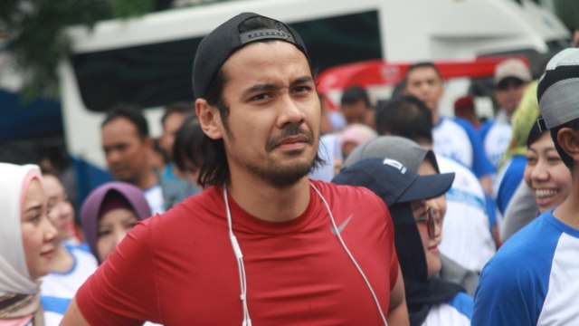 Chicco Jerikho ikut lomba lari di Sudirman - HI (Foto: Munady)