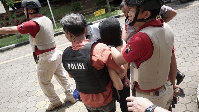 Penyerangan Polres Banyumas (Foto: Idhad Zakaria/Antara)