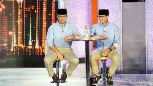 Anies-Sandi dalam debat pilgub putaran kedua. (Foto: Aditia Noviansyah/kumparan)