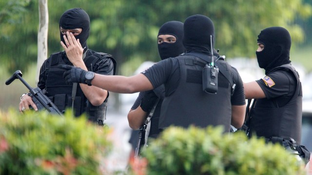 Penjagaan sidang sidang Siti Aisyah. (Foto: Reuters/Lai Seng Sin)