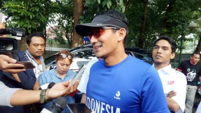 Sandi lari pagi sebelum mencoblos. (Foto: Amanaturrosyidah/kumparan)