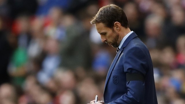 Southgate pernah dibimbing Bloxham. (Foto: Reuters/Carl Recine)