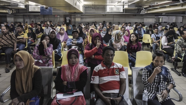 TKI di Malaysia. (Foto: Antara/Hafidz Mubarak A.)