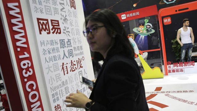 Perusahaan media digital China (Foto: AP Photo/Andy Wong)