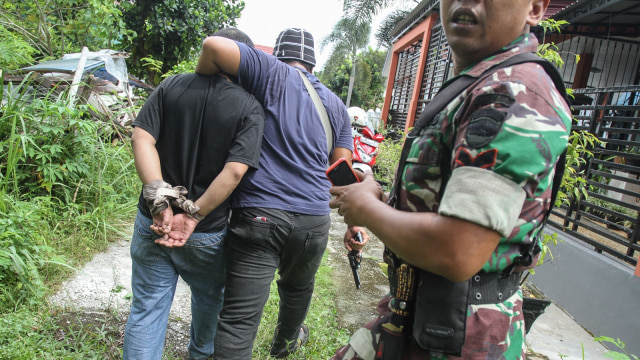 Tangkap Napi Pekanbaru yang Kabur. (Foto: Antara/Rony Muharrman)