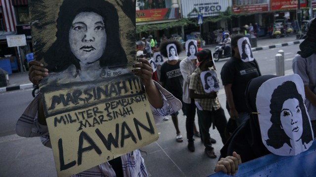 Aksi topeng Marsinah (Foto: ANTARA FOTO/Hendra Nurdiyansyah)
