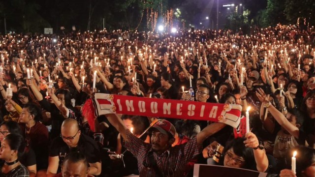 Aksi lilin untuk Ahok (Foto: Fanny Kusumawardhani/kumparan)