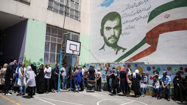 Pemilu di Iran. (Foto: TIMA/via REUTERS )
