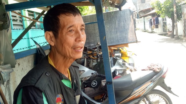 Hermanto, supir Gojek yang motornya "disulap" (Foto: Akbar Ramadhan/kumparan)