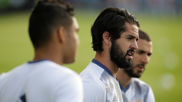 Isco pada sesi latihan. (Foto: Miguel Vidal/Reuters)