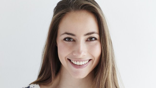 Wanita tersenyum. (Foto: Thinkstock)