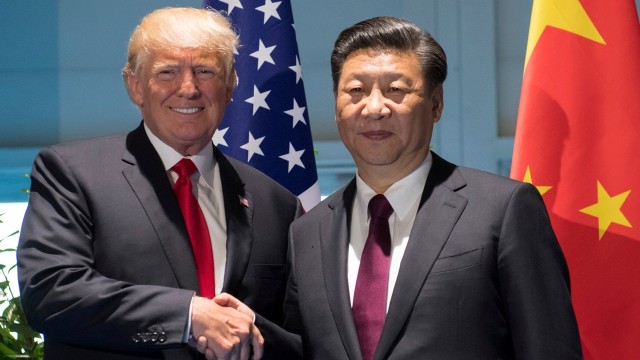 Donald Trump dan Xi Jinping di KTT G20 (Foto: REUTERS/Saul Loeb)