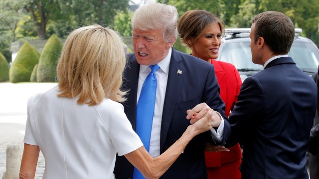 Donald Trump, Emmanuel Macron, dan Melania Trump (Foto: REUTERS/Michel Euler/Pool)