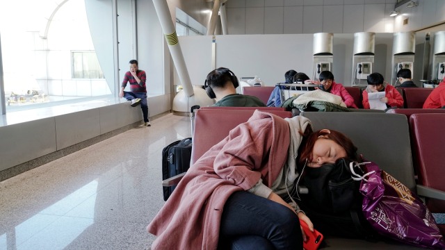 Zhao Yuqing perjalanan menuju rumah Wang Quanming (Foto: Reuters)