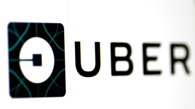 Logo Uber (ilustrasi). Foto: REUTERS/Thomas White