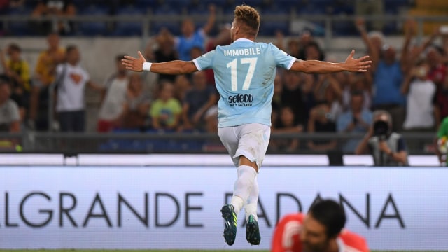 Immobile merayakan gol ke gawang Juventus. (Foto: Reuters/Alberto Lingria)
