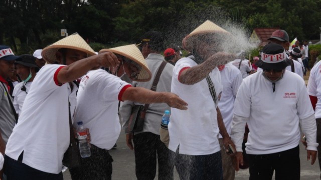 Aksi Demo Petani Tebu di depan Istana Negara (Foto: Fanny Kusumawardhani/kumparan)