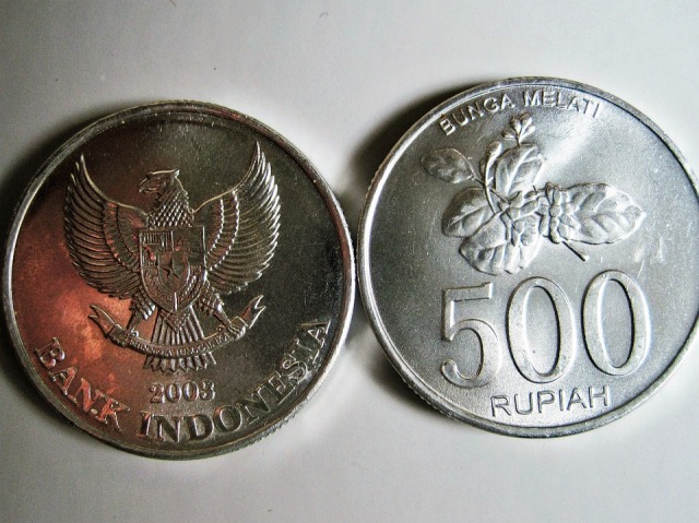 Perbedaan Sistem Bunga vs Sistem Bagi Hasil