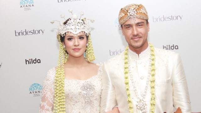 Raisa dan Hamish resmi menjadi suami - istri. (Foto: Munady)
