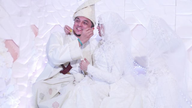 Pernikahan Bella dan Engku Emran. (Foto: Instagram @noradanish)