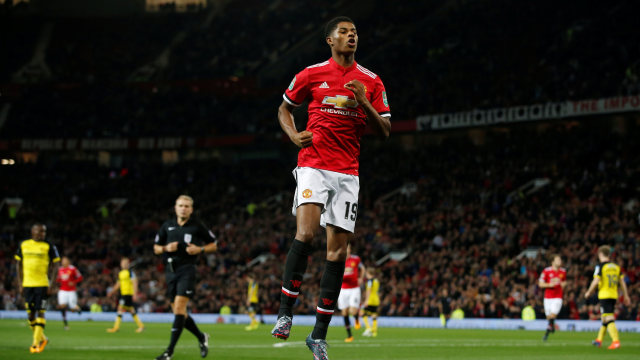 Marcus Rashford mencetak dua gol. Foto: Reuters/Andrew Yates