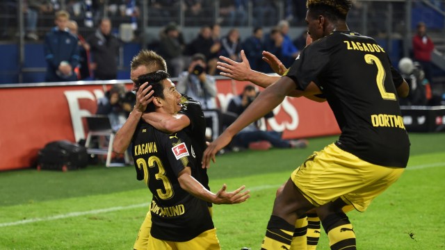 Shinji Kagawa berselebrasi. (Foto: Reuters/Fabian Bimmer)