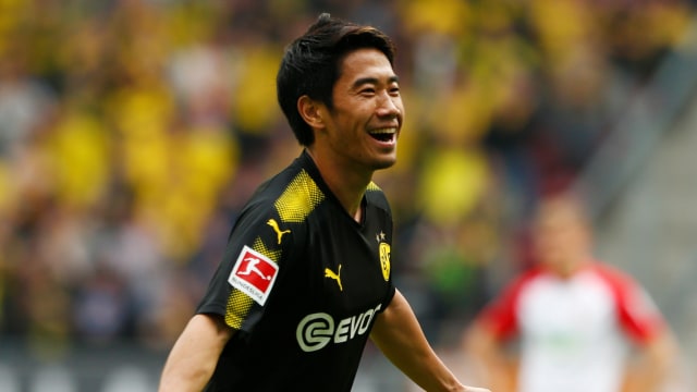 Kagawa melakukan selebrasi. (Foto: Reuters/Michaela Rehle)