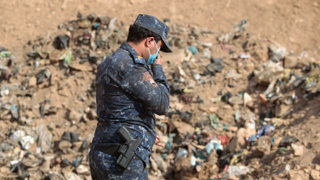 Kuburan masal Iraq (Foto: AHMAD AL-RUBAYE / AFP)